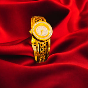 Aanandita Golden watch