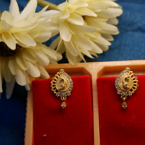 Golden peacock diamond earring
