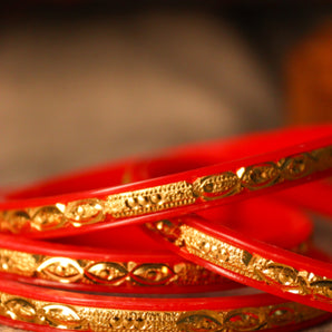 Aanandita Golden Red Pola Trendy Bangles