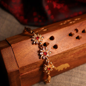 Aanandita Golden Beautiful Red Mina Flower AD Bracelet