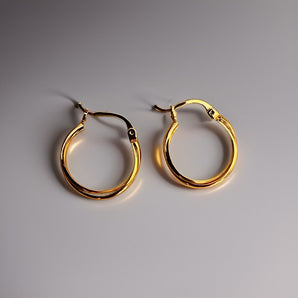 Aanandita Golden Twisted Hoop Earring