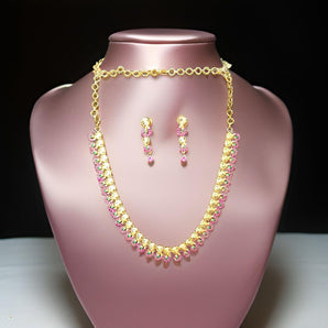 Aanandita Golden Pink AD Necklace With Earring